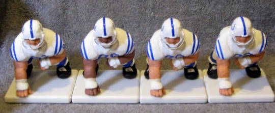 1958 BALTIMORE COLTS DEFENSIVE LINE STATUES BY FRED KAIL