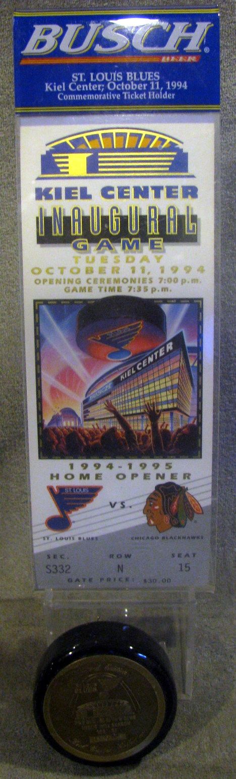 Lot Detail - 1994 ST. LOUIS BLUES &quot;KEIL CENTER&quot; INAUGURAL GAME SOUVENIR TICKET AND PUCK PAPERWEIGHT