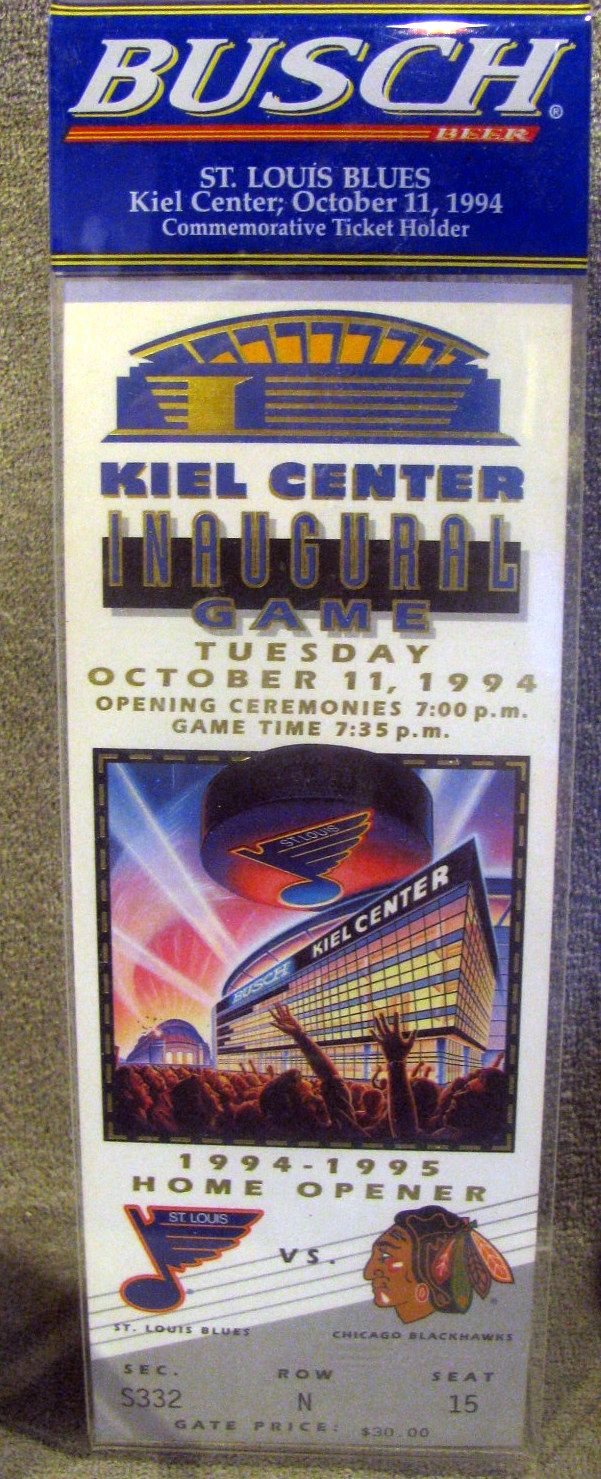 Lot Detail - 1994 ST. LOUIS BLUES &quot;KEIL CENTER&quot; INAUGURAL GAME SOUVENIR TICKET AND PUCK PAPERWEIGHT