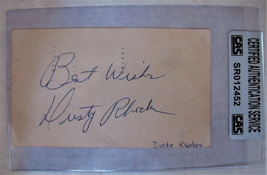  DUSTY RHODES BEST WISHES SIGNED 1957 GOVERMENT POSTCARD - CAS AUTHENTICATED