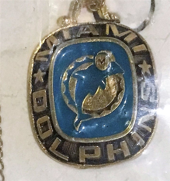 80's MIAMI DOLPHINS NECKLACE SEALED IN PACKAGE