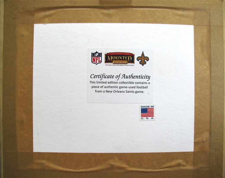 NEW ORLEANS SAINTS GAME USED PIECE OF FOOTBALL w/MOUNTED MEMORIES