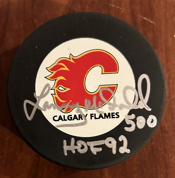 LANNY MCDONALD SIGNED CALGARY FLAMES HOCKEY PUCK w/COA