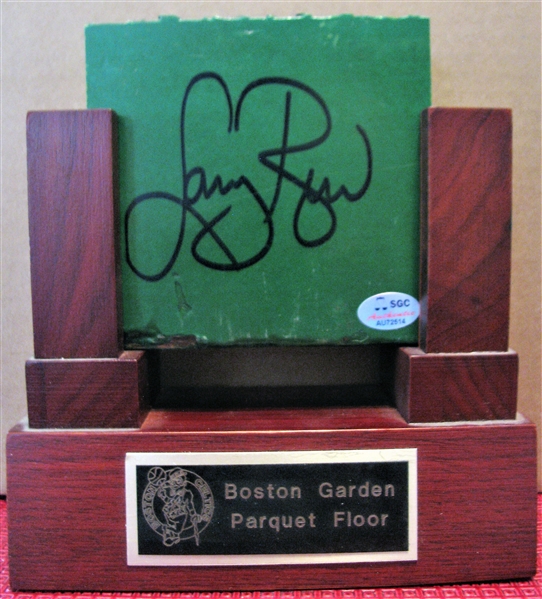 LARRY BIRD SIGNED PIECE OF BOSTON GARDEN PARQUET FLOOR w/ SGC COA